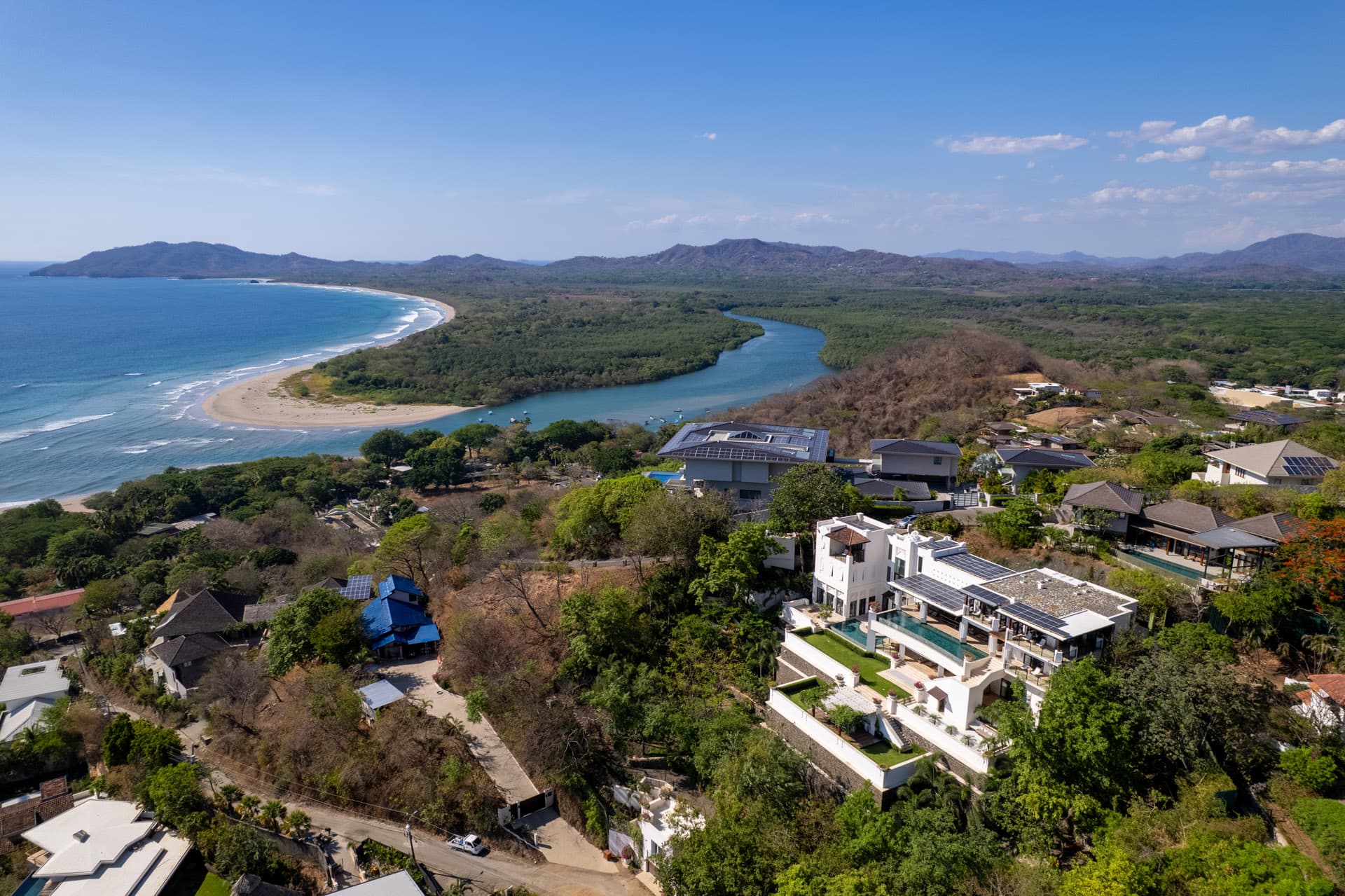 Villa Luciérnaga above Tamarindo — bay and Pacific beyond