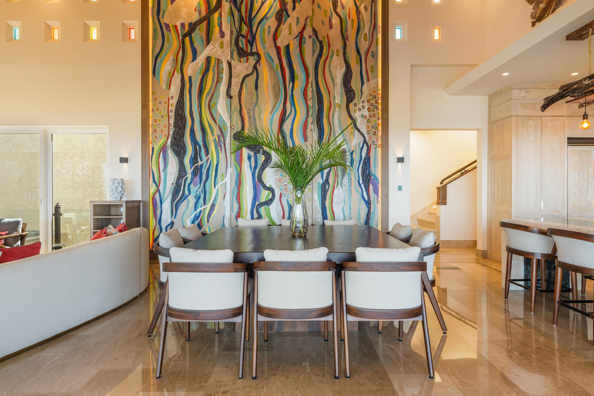 Abraham Valenzuela's large abstract canvas in the dining hall at Villa Luciérnaga -- painted by the architect himself, a signature piece of the property