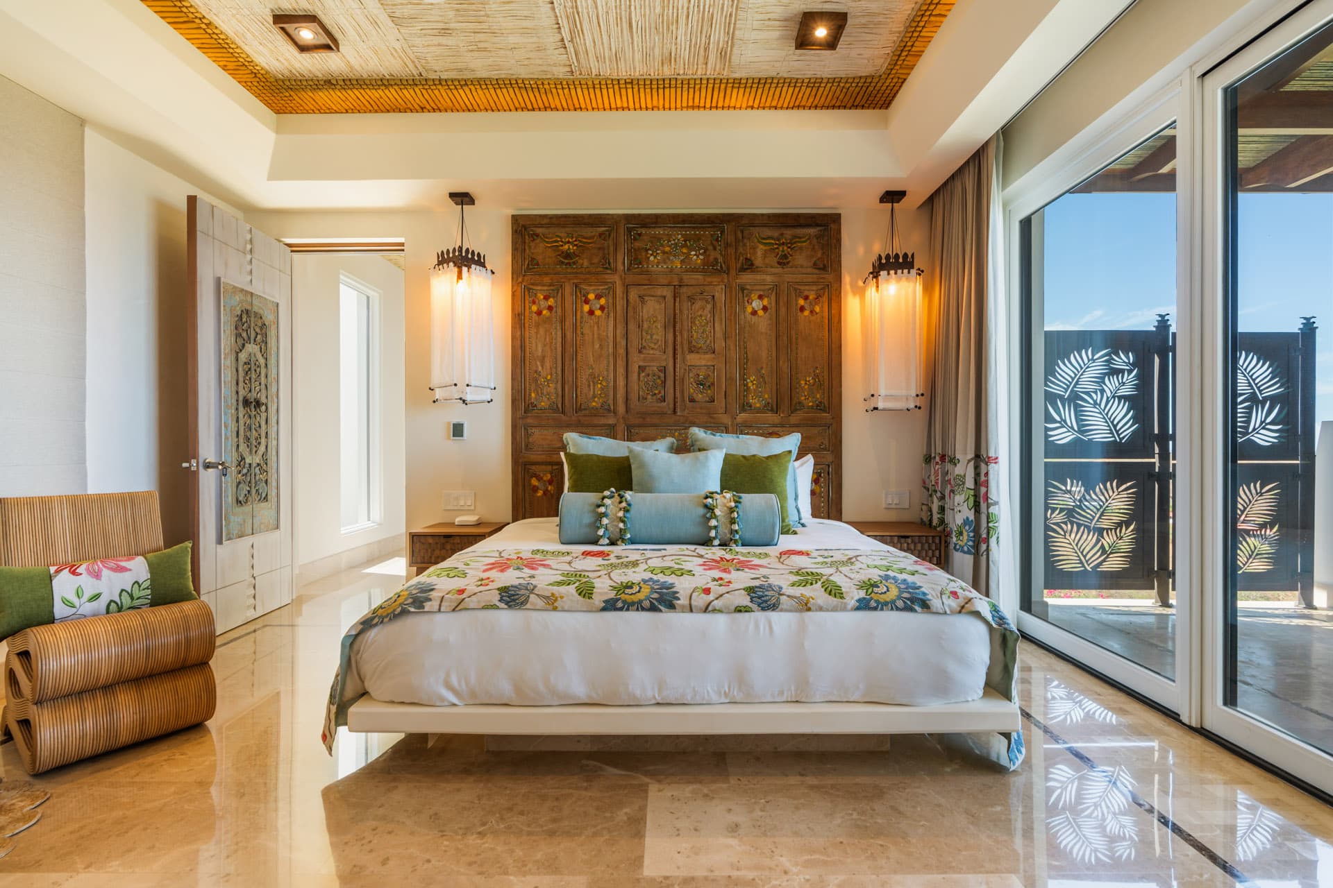 The Elephant Suite — carved headboard and private staircase