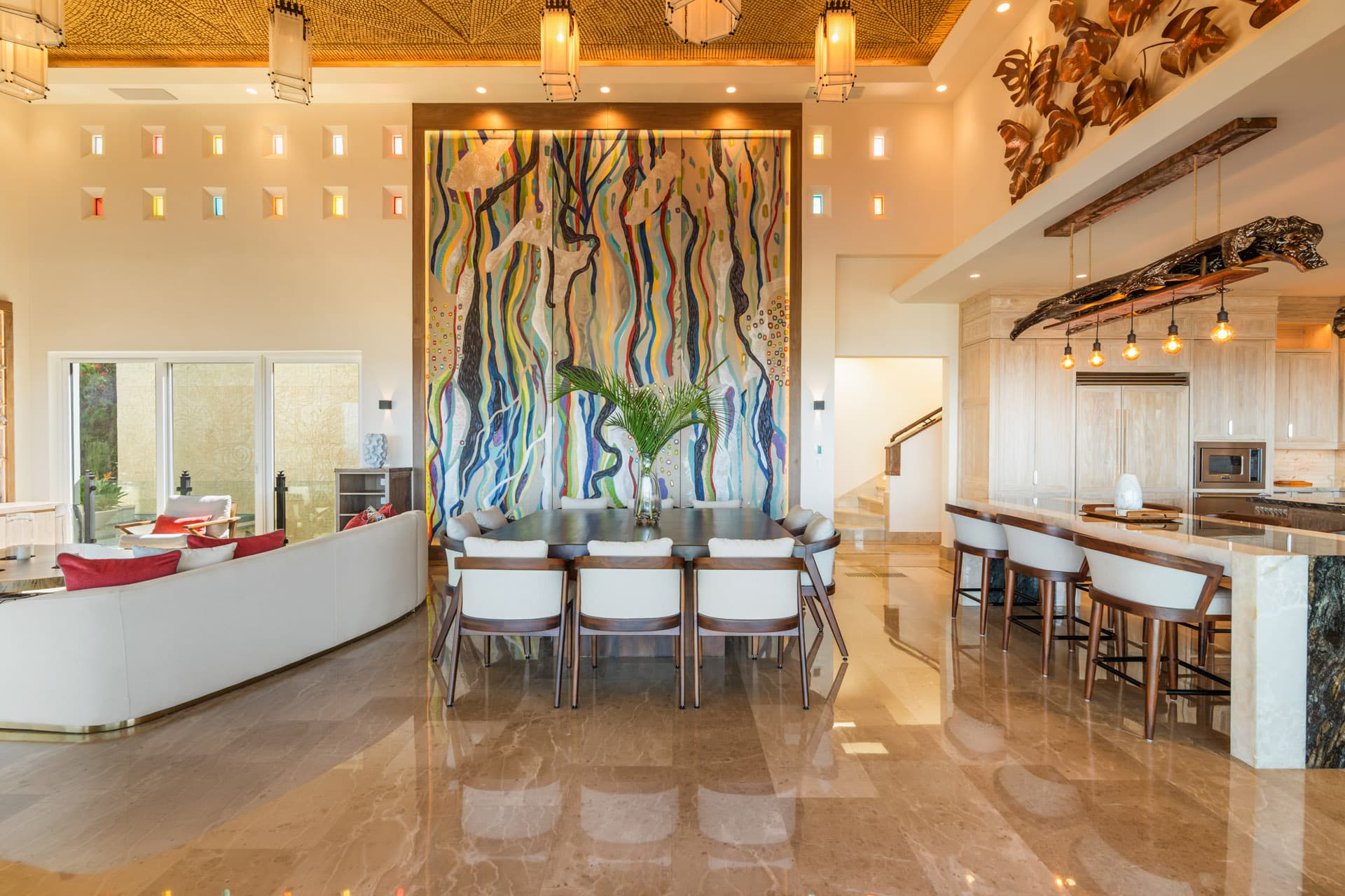 Great room — Valenzuela canvas and reclaimed wood feature wall